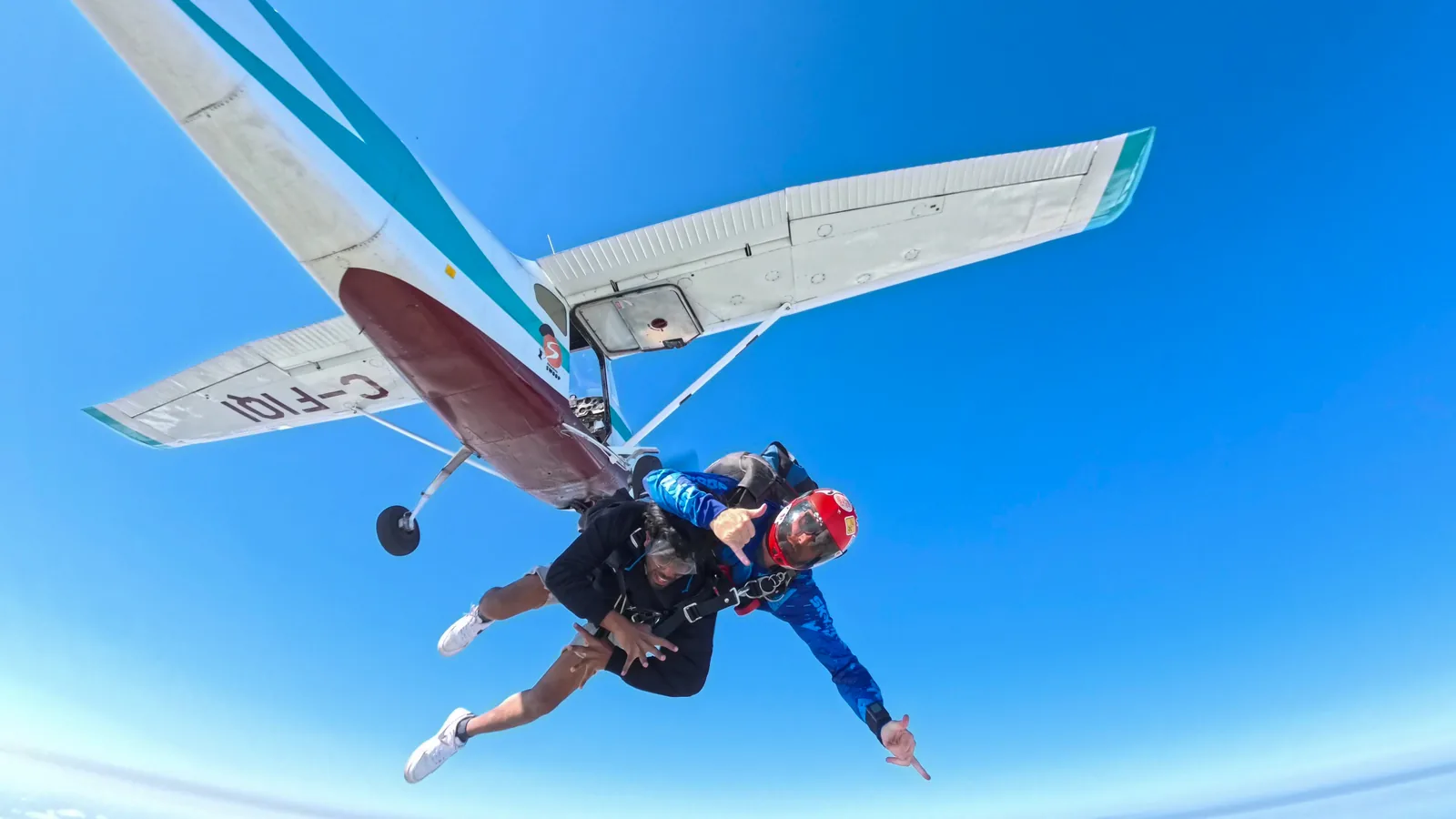A tandem pair in freefall just after aircraft exit